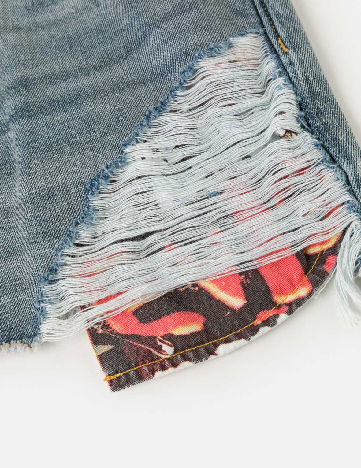 Distressed Denim Shorts with Printed Pocket Lining - Image 7
